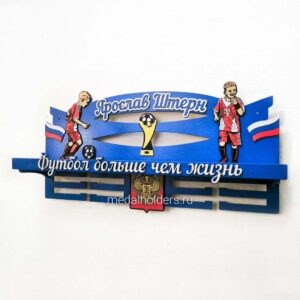 Держатель медалей футболиста